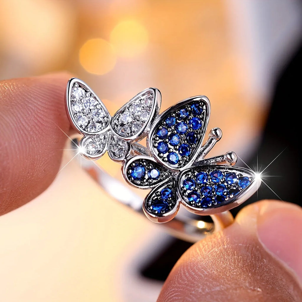 Blue and white butterfly ring for women in copper with electroplated finish, sizes 6-10