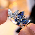 Blue and white butterfly ring for women in copper with electroplated finish, sizes 6-10