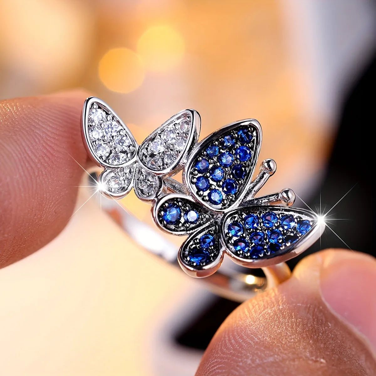Blue and white butterfly ring for women in copper with electroplated finish, sizes 6-10