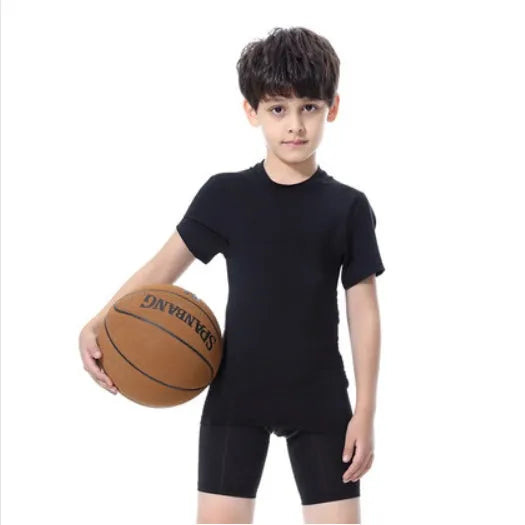 Children's black and green polyester-spandex sportswear set with T-shirt and trousers.