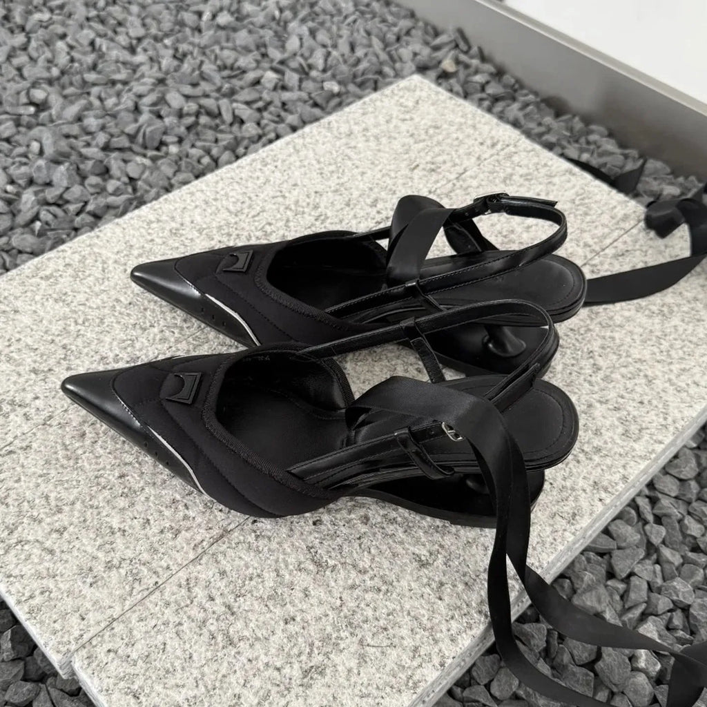 Women's special-shaped lace-up high heels in black and pink with a cowhide upper.