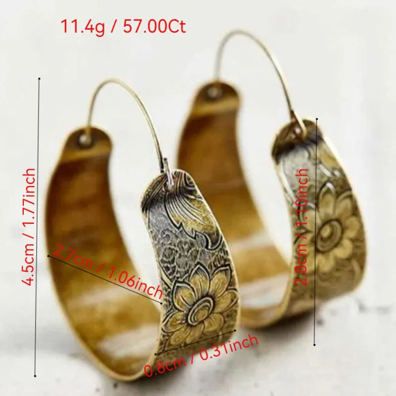 Gold geometric hollow pattern earrings with petal detailing on alloy construction