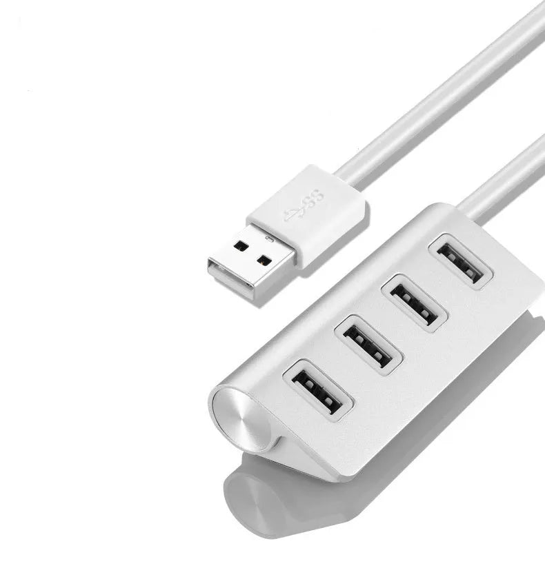Silver USB-C to 4-Port USB 2.0 hub with aluminium alloy body on white background