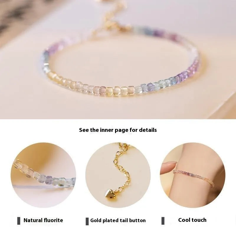Handmade women's bracelet with geometric copper links and rainbow fluorite decoration