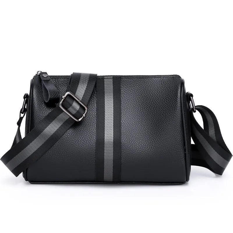 Black genuine leather crossbody bag with dimensions 24x16x13cm showing large capacity and polyester lining