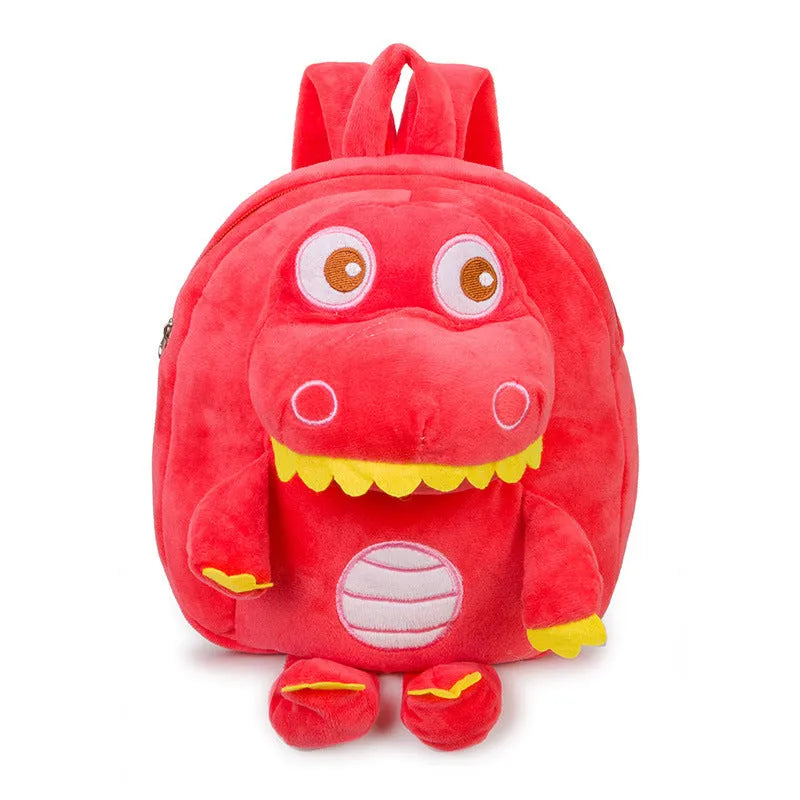 Soft blue plush children's backpack with an embroidered dinosaur character and a soft handle.