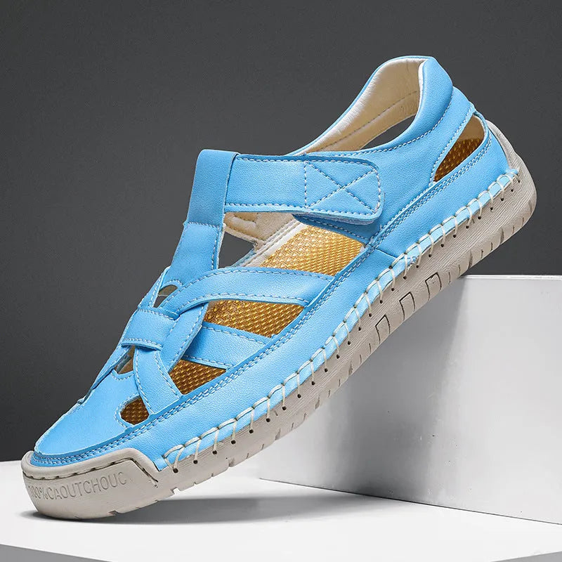 Women's low-top casual sandals with Velcro straps and a round toe in a solid colour.