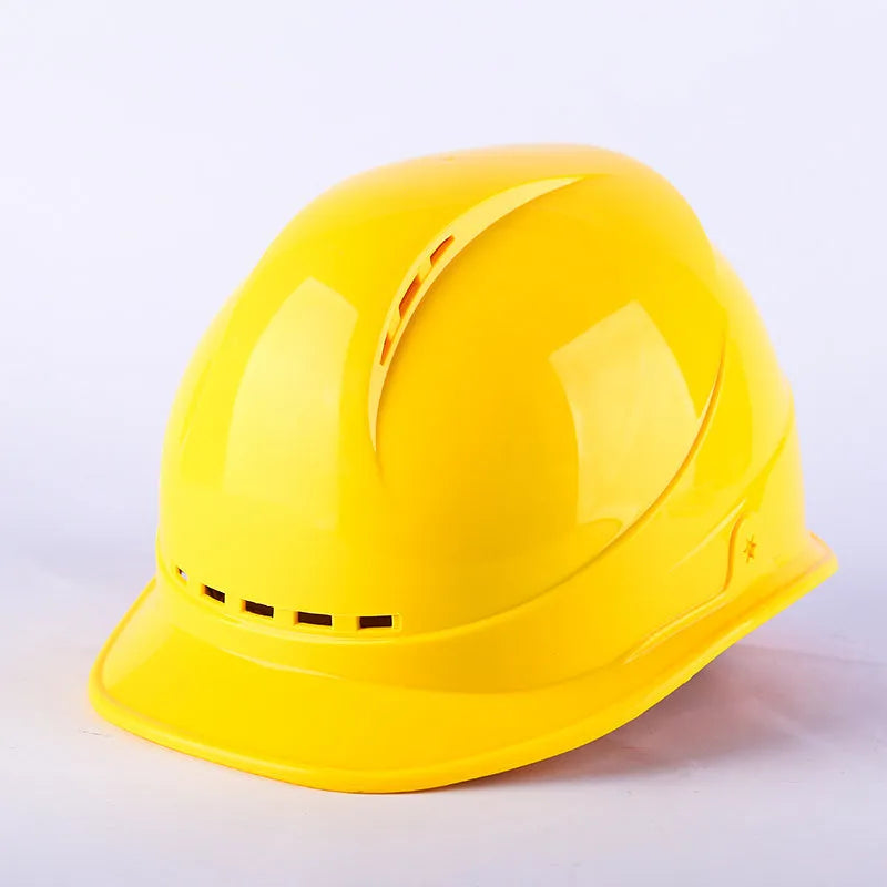 Construction safety helmet in red with adjustable rear hoop and vent holes