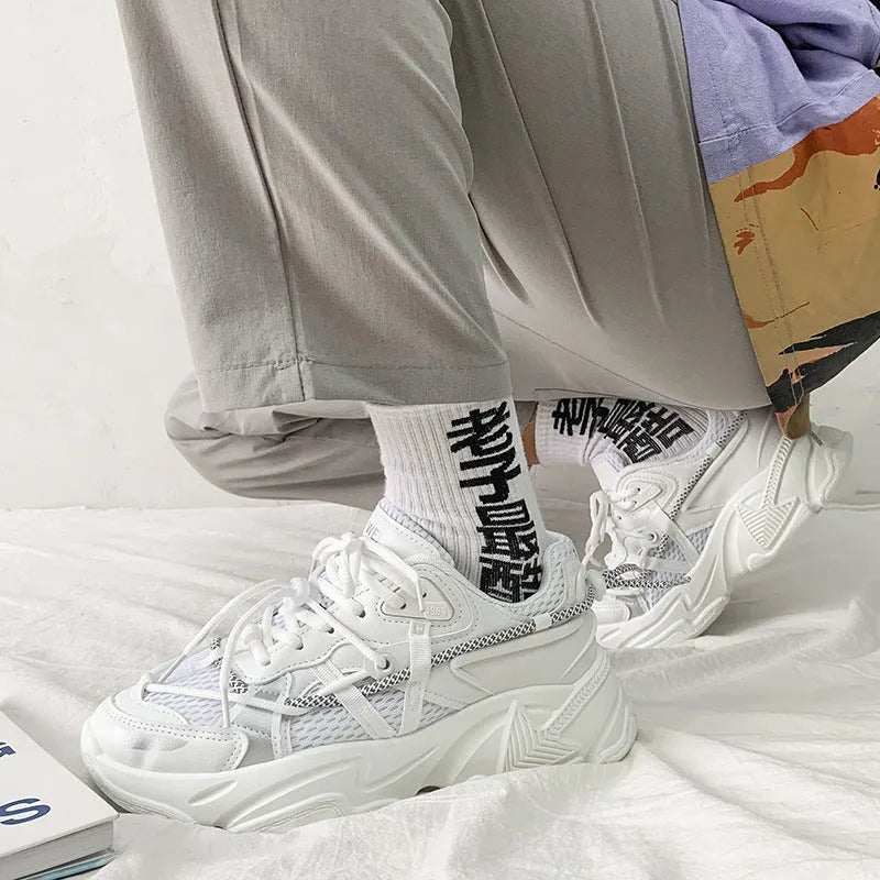 Men's white Korean-style platform dad sneakers with lace-up front and breathable mesh lining.