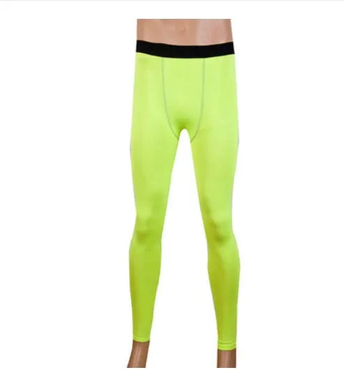 Children's black and green polyester-spandex sportswear set with T-shirt and trousers.