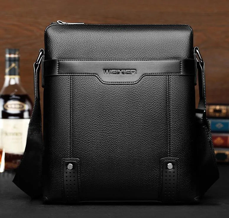 Men's fashion PU leather messenger bag with zipper closure in black, solid pattern, interior phone pocket