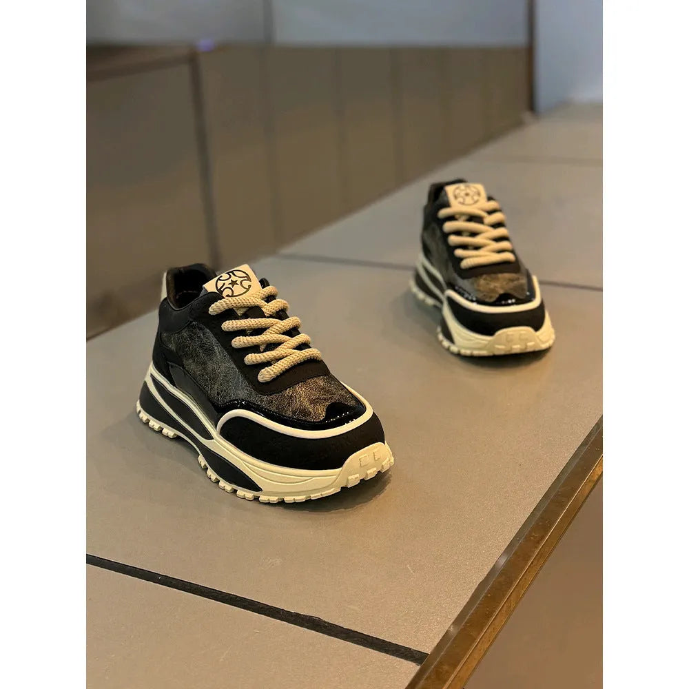 Men's black thick sole retro lace-up sneakers with a round toe and wear-resistant outsole.