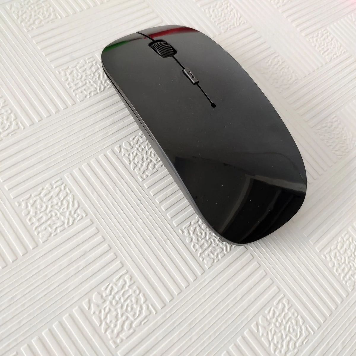 Bluetooth dual-mode wireless mouse in grey with mute buttons and 15cm USB charging cable