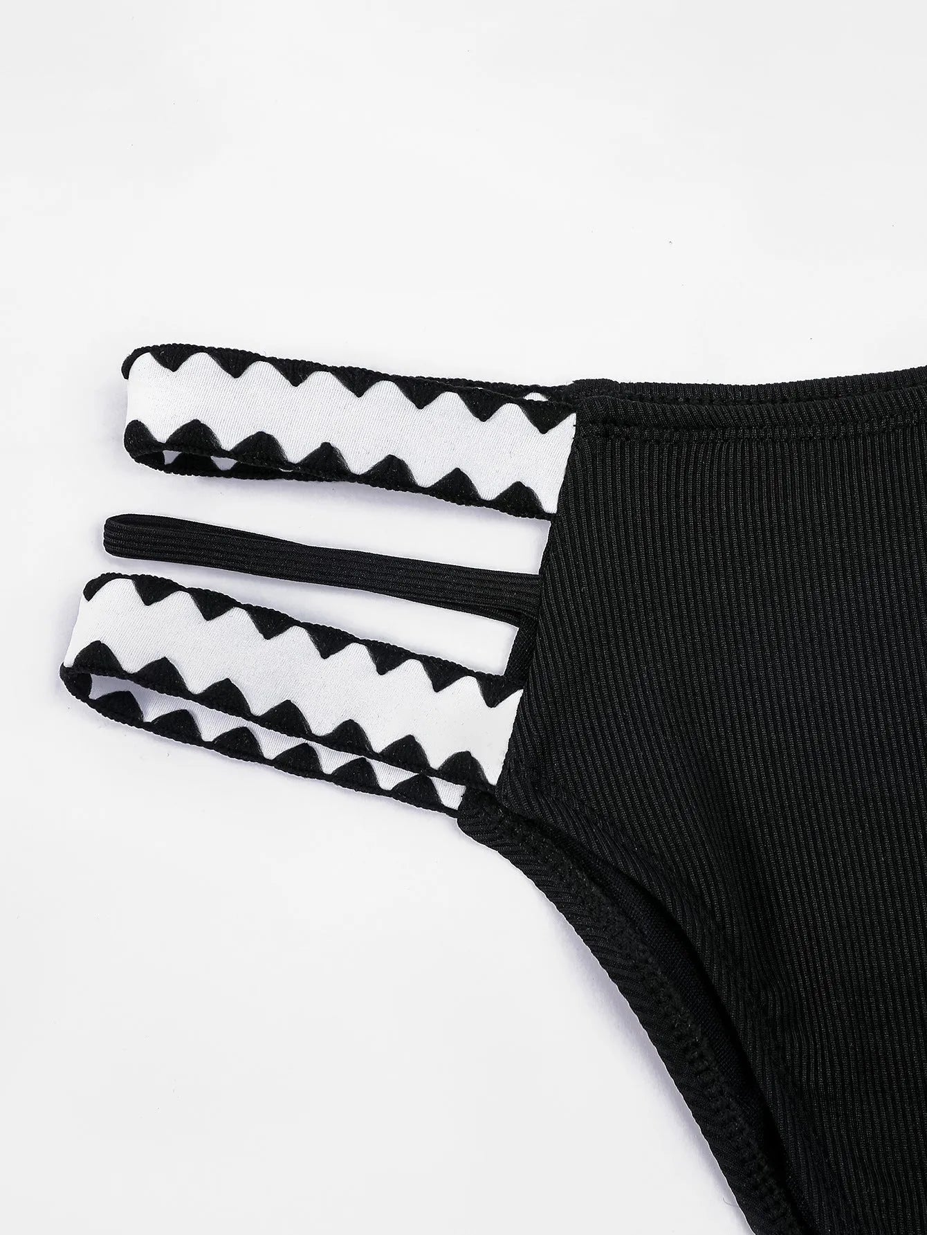 Black women's one-piece swimsuit with hollowed-out split briefs design