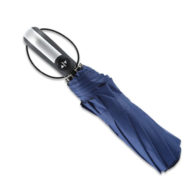 Triple-fold automatic open business umbrella with a black canopy, steel ribs, and rubber handle.