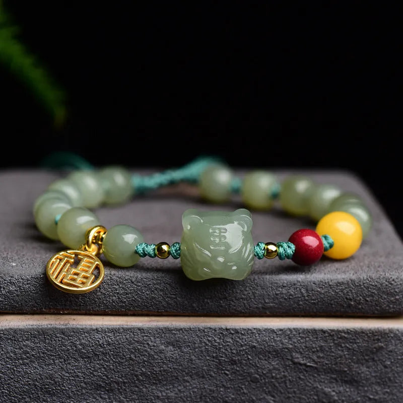 Natural Hetian jade bracelet with animal zodiac modelling and 5x7mm beads