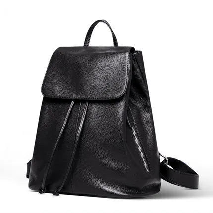Soft black genuine leather women's backpack in Korean street trend style, showing multiple internal compartments.