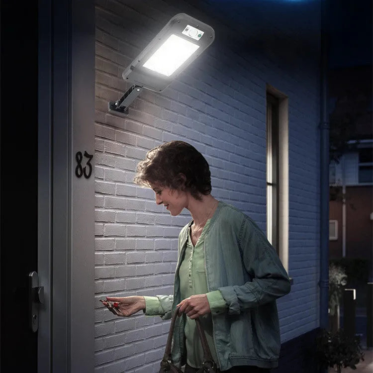 Solar wall light with 160COB lamp beads and human body induction for outdoor use