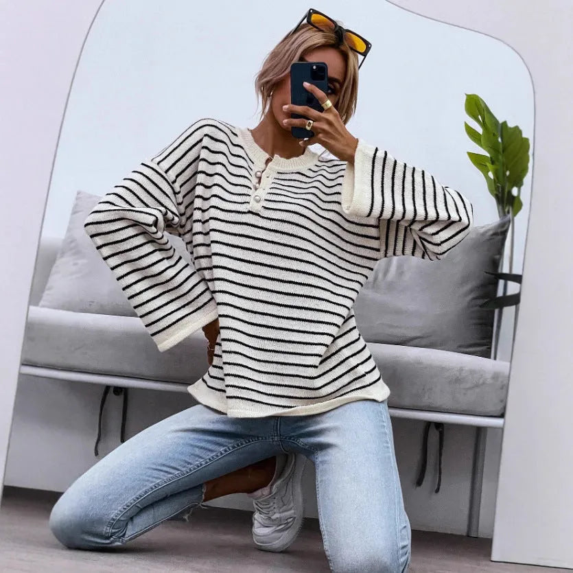 Black striped women's casual top with drop-shoulder sleeves made from viscose fibre knitted fabric