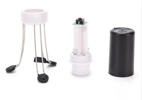 White and black automatic stirrer blender on a kitchen counter
