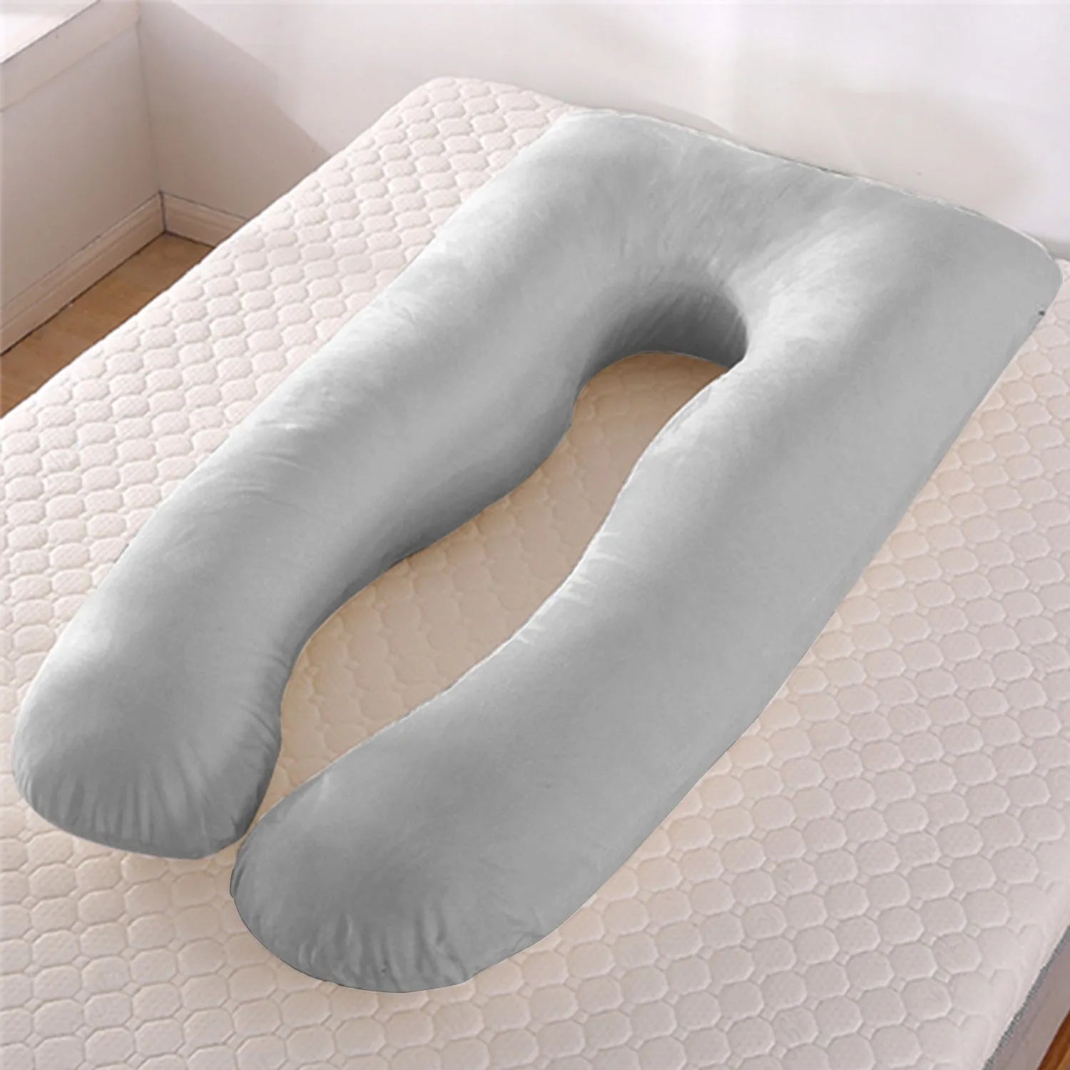 U-shaped maternity pillow with ice silk cover in green colour showing curved design for pregnancy support