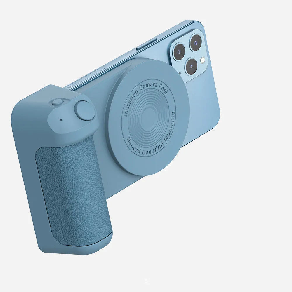 Black multifunctional phone camera holder with magnetic suction and rotatable stand on a table.