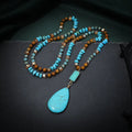 Blue turquoise imitation mineral pendant necklace with heart-shaped drop design on ball bead chain