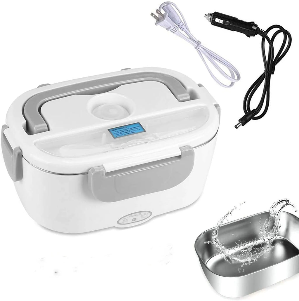 Grey dual voltage electric lunch box with plastic body shown next to a car socket and mains plug