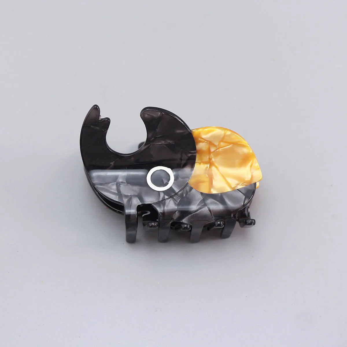Handmade cellulose acetate beetle grip hair accessory with cartoon insect design