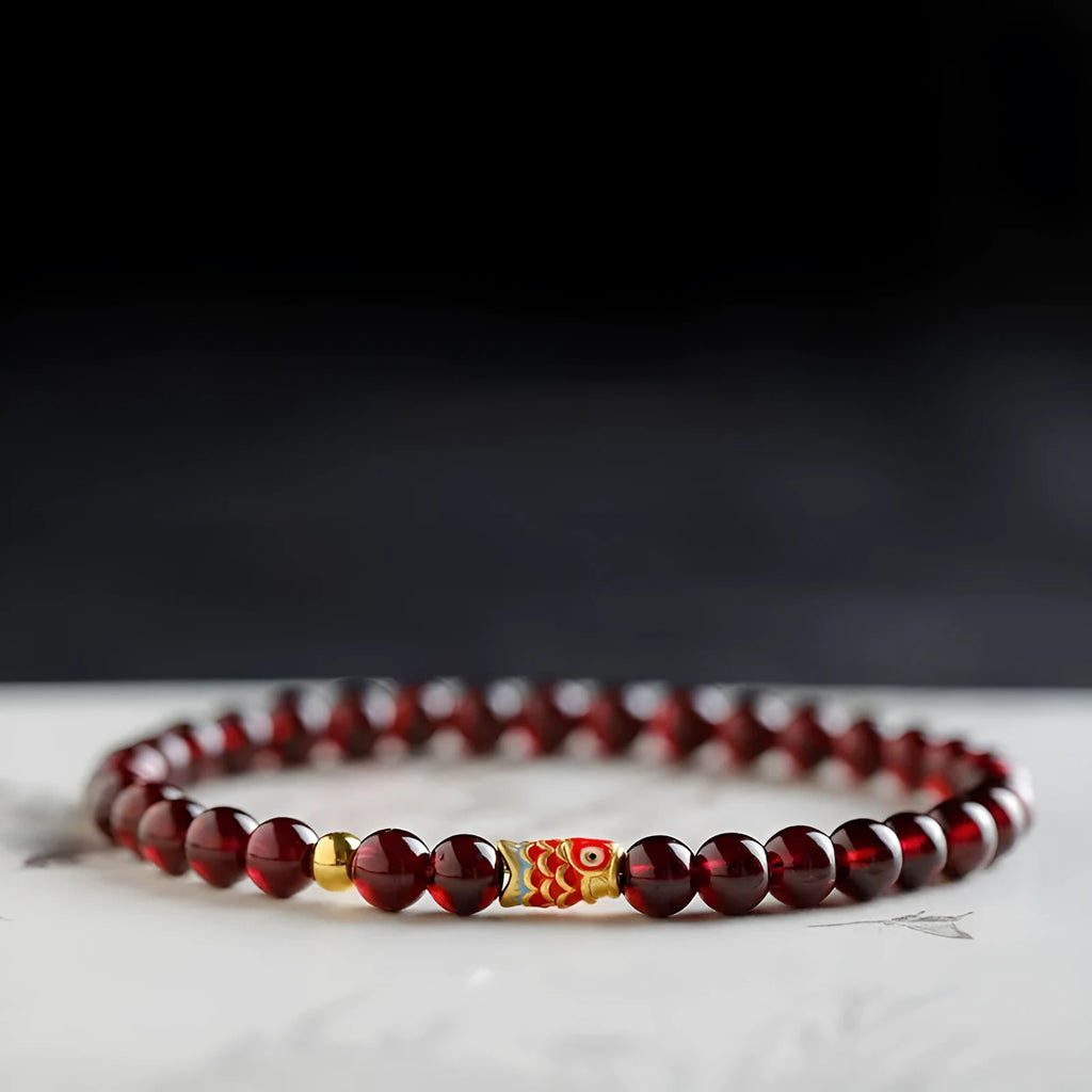 Wine red garnet coloured glass bead bracelet in New Chinese style, shown in single and double circle options.