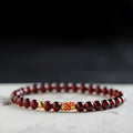 Wine red garnet coloured glass bead bracelet in New Chinese style, shown in single and double circle options.