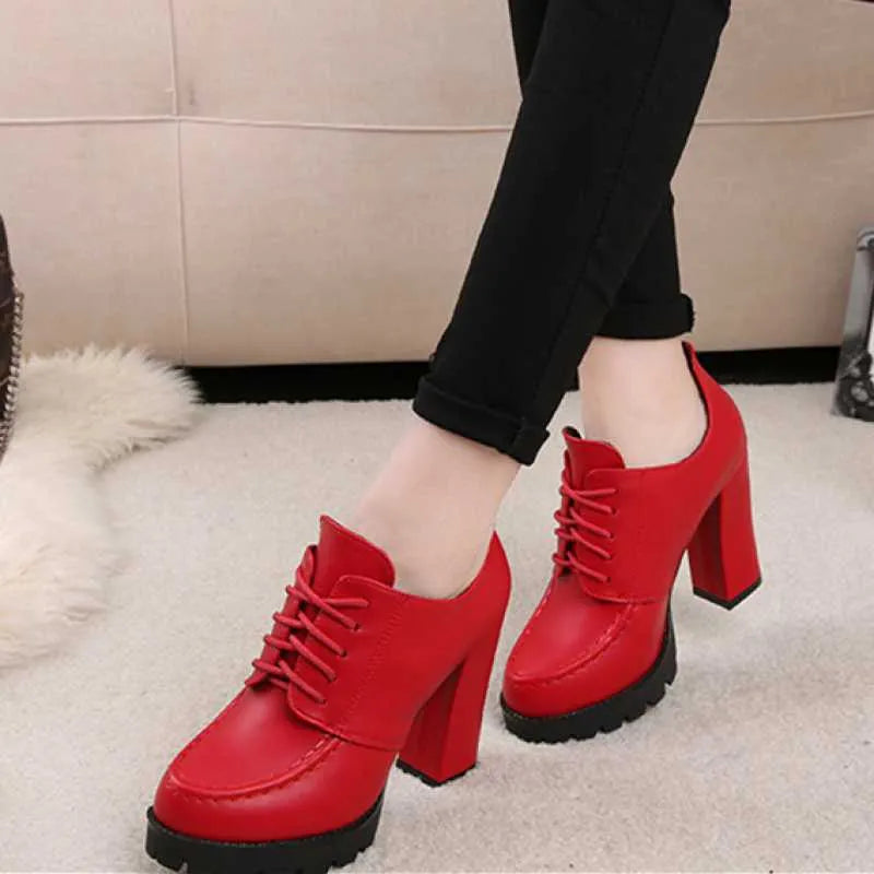 Women's black platform boots with thick heel, PU upper, lace-up front, and round toe