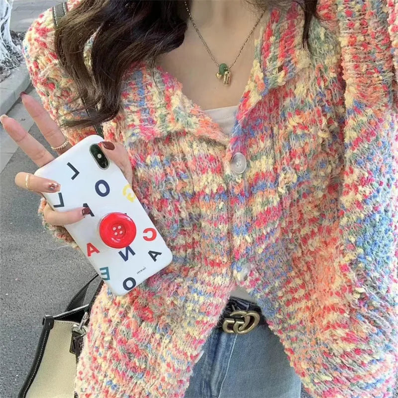 A retro-style slim fit knitted cardigan in a soft pink or green colour with a textured toothbrush hair fabric.