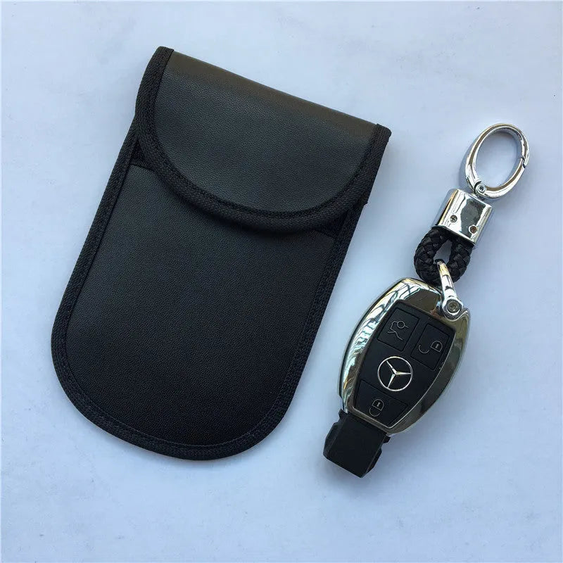 Black signal blocking pouch for car key fob protection measuring 20x10cm