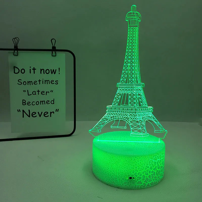 Eiffel Tower shaped 3D acrylic table lamp displaying seven colours, with touch controls and remote.
