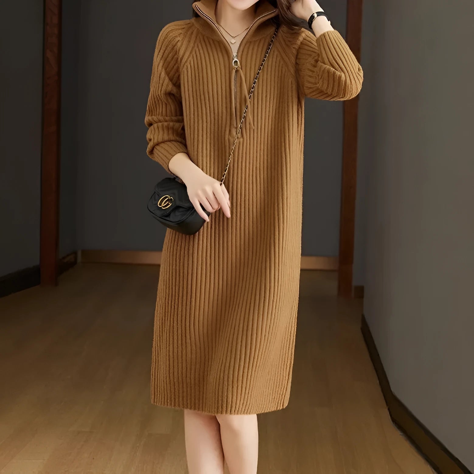 Beige half-zip woollen midi dress with long sleeves and a stand collar, laid flat.