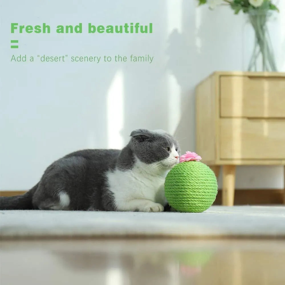 Green cactus-shaped cat activity tower with sisal scratching post and a tumbler ball catnip toy.