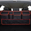 Black car boot hanging organiser bag with red piping, showing top handle and 45x40cm size.