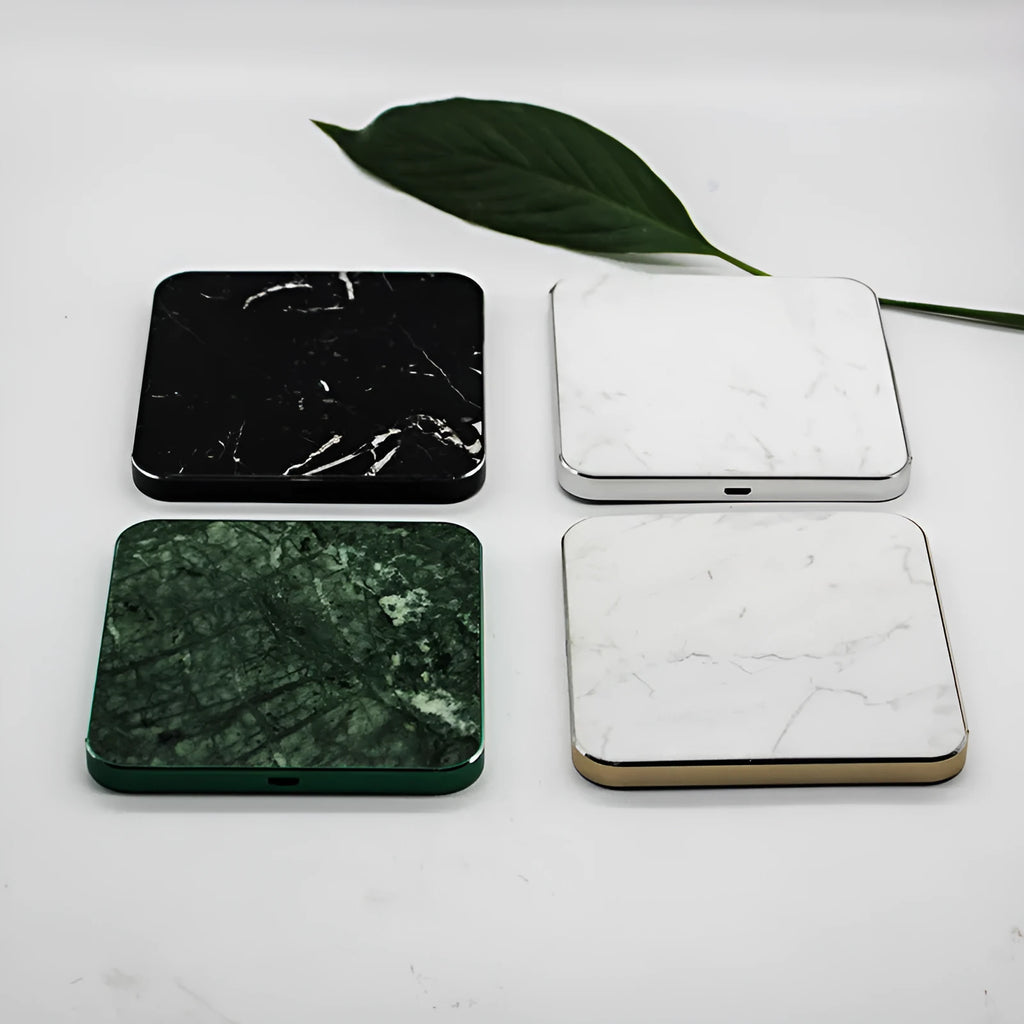Real marble wireless charger with aluminium alloy base on desk showing indicator light
