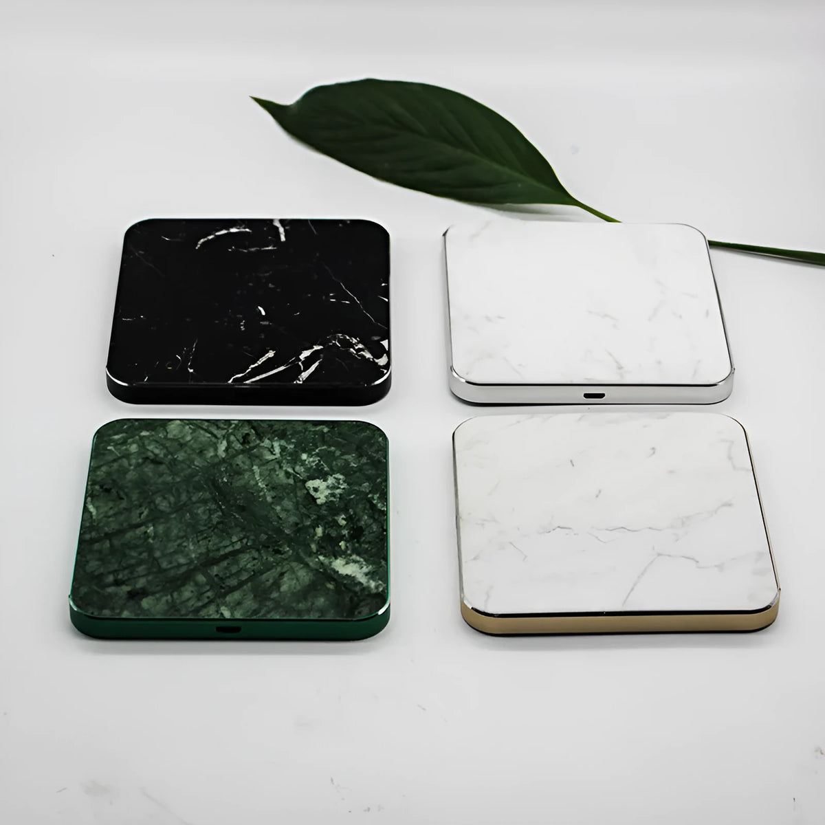 Real marble wireless charger with aluminium alloy base on desk showing indicator light