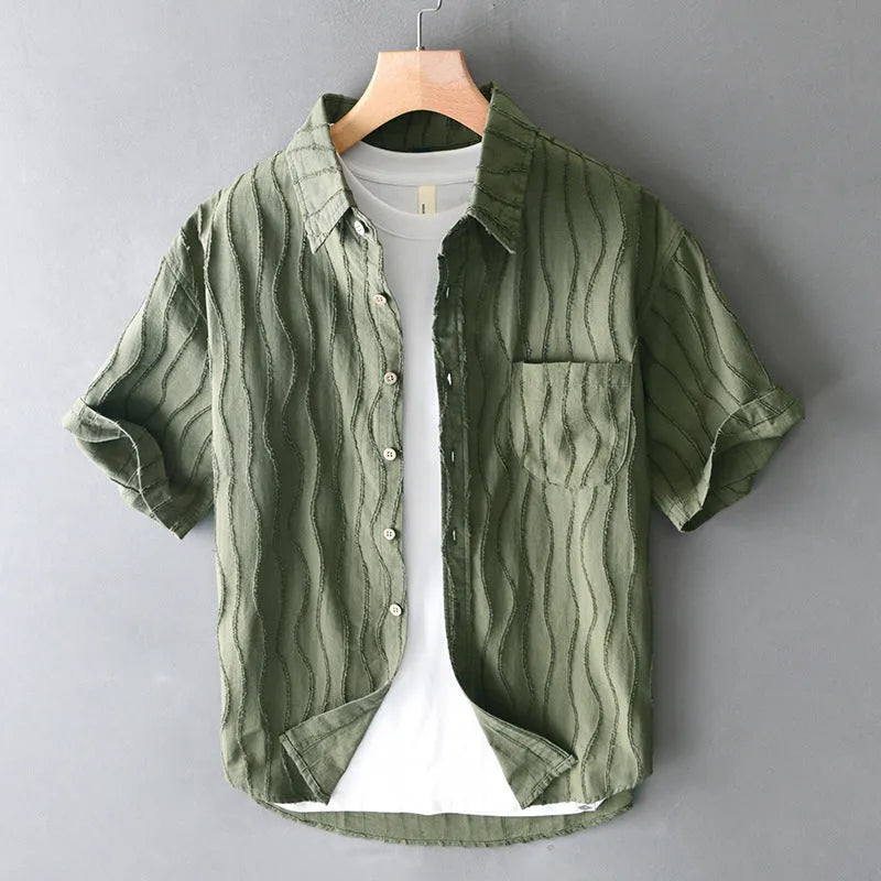 Men's loose fit pure cotton short sleeve casual shirt in apricot colour on a hanger.