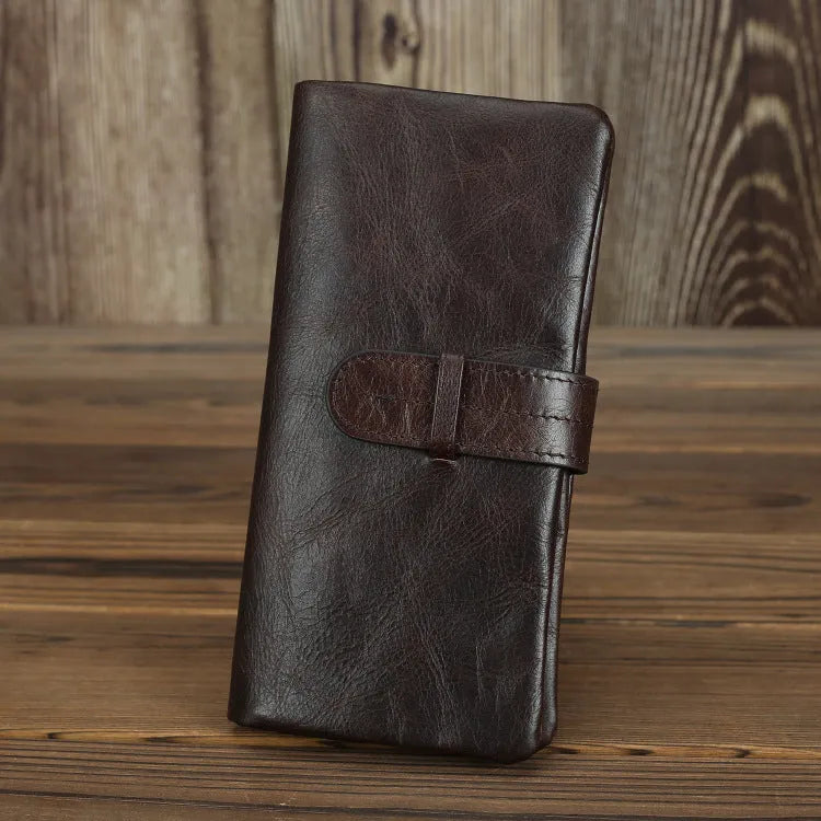 Genuine leather women's wallet with multiple card slots in brown colour showing sewing thread detailing