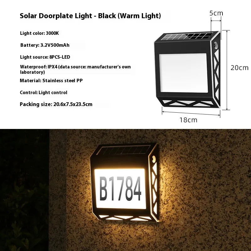 Solar powered waterproof doorplate light with LED illumination in black or silver finish