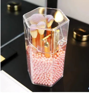 Transparent acrylic makeup brush storage bucket in white on bedroom table