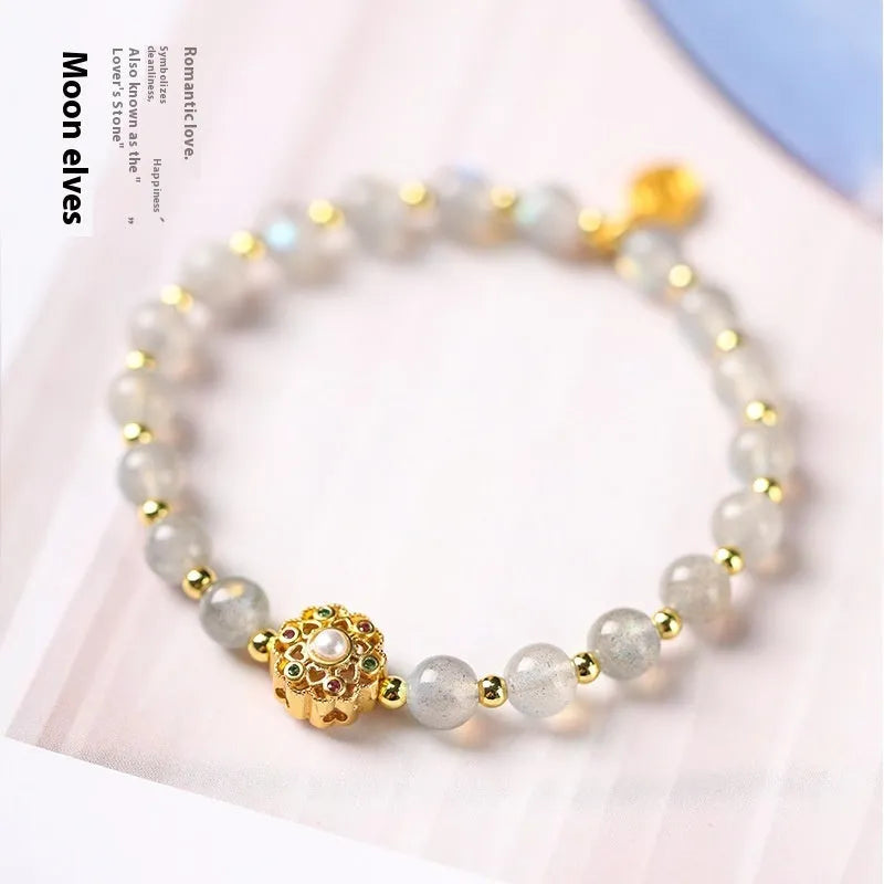 Hand-woven crystal bracelet with grey moonstone, sunstone, and strawberry quartz 6mm beads