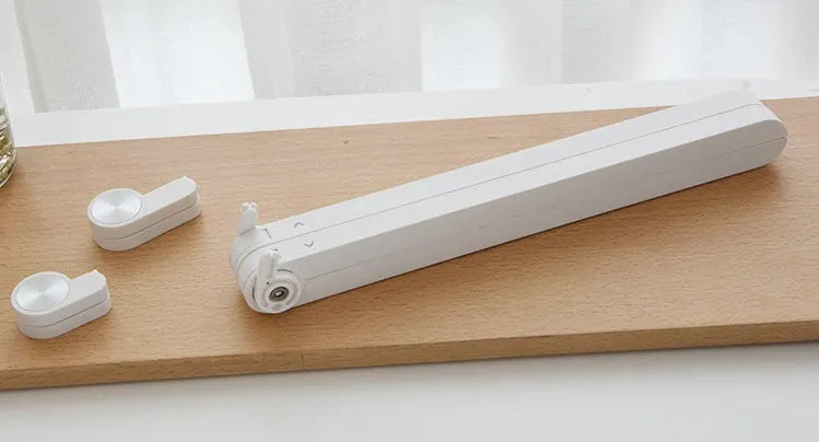 White aluminium laptop stand for Apple MacBook with folding design
