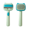 Blue and green double-sided pet grooming brush with deshedding rake and dematting comb.