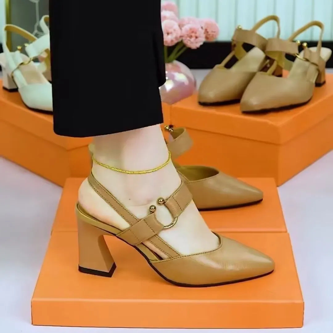 Women's apricot leather closed toe sandals with a chunky high heel and backless oversleeve design on a rubber sole.