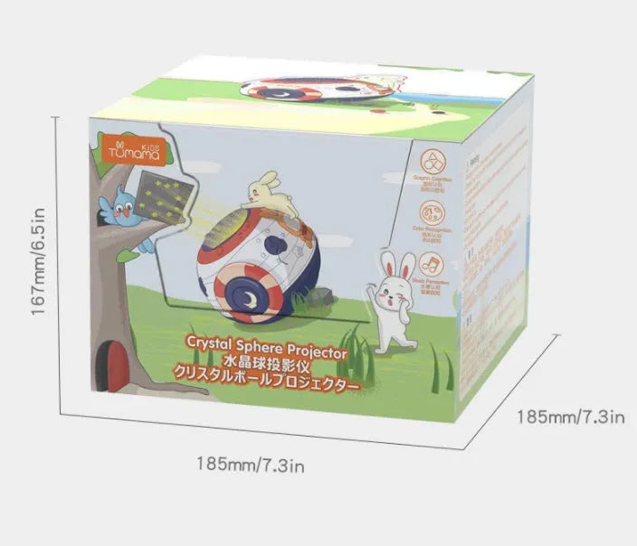 White plastic starry sky night light projector for children on a table, projecting blue stars onto a wall.
