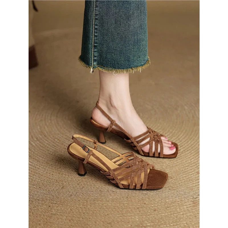 Women's light brown retro sandals with thin cross straps and an ankle buckle on a 3-6cm heel.
